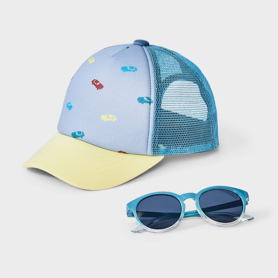 Blue toddler trucker hat with car print and matching toddler sunglasses on a white background