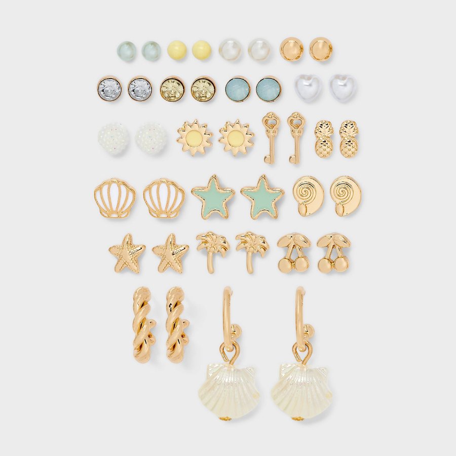 Display card with many small colorful stud earrings in beach shapes