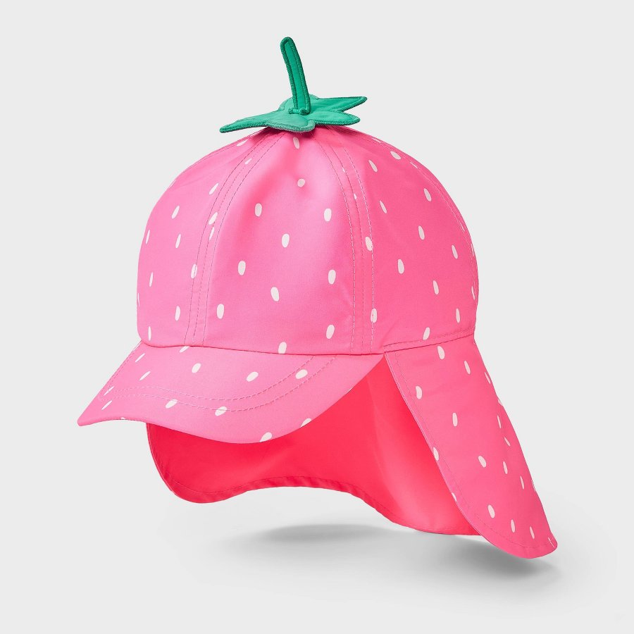 Pink toddler swim hat with strawberry print on a white background