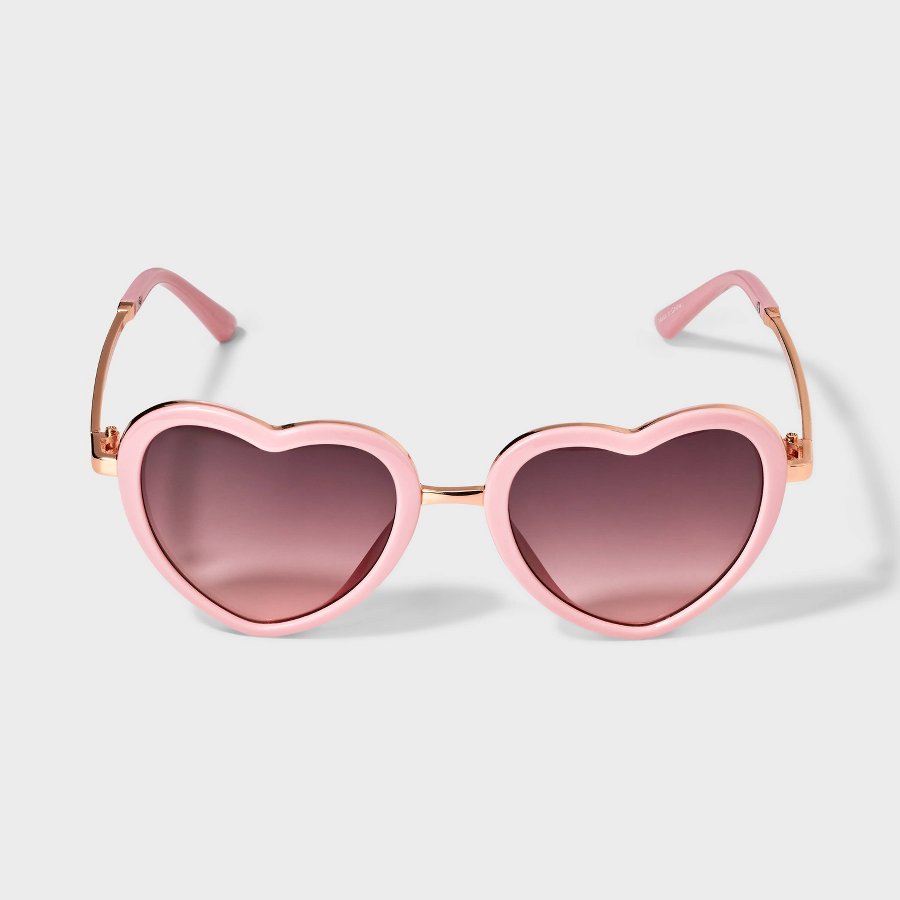 Light pink girls heart aviator sunglasses on a white background