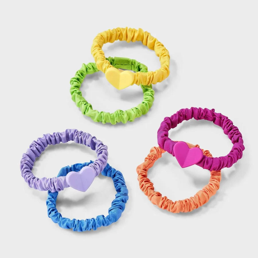 Bright Cat & Jack scrunchies arranged in pairs on a light gray background