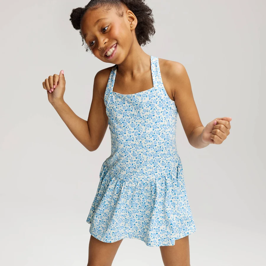 Sleeveless knit dress for girls on a neutral studio background